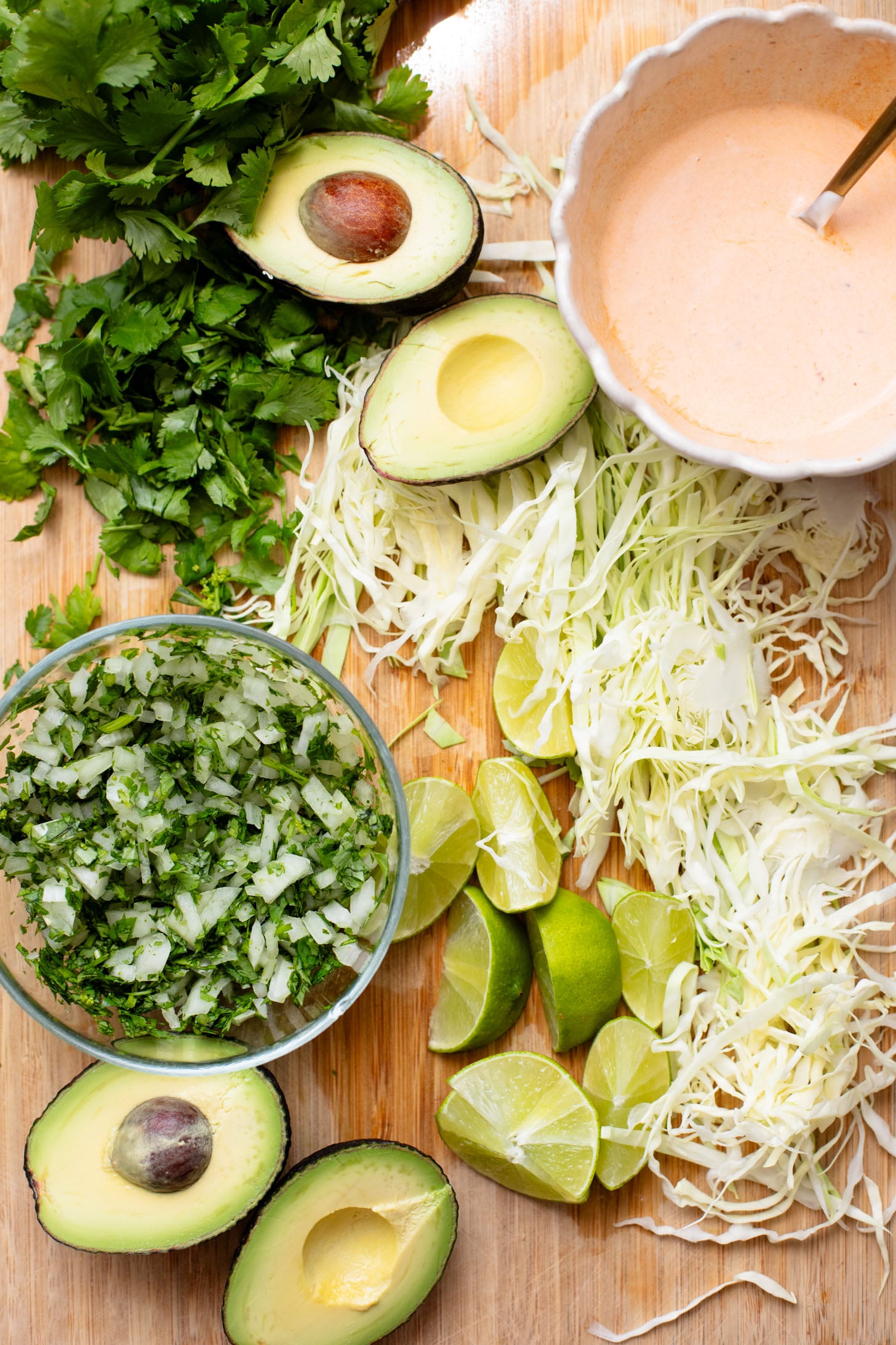 These Sheet Pan Tofu Burritos are filled with crispy tofu, shredded cabbage, cilantro, onions, avocado and dairy-free chipotle mayo | ThisSavoryVegan.com