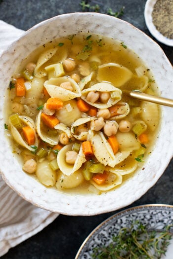 This Slow Cooker Chickpea Noodle Soup is comfort in a bowl. A vegan twist on chicken noodle soup...that tastes even better | ThisSavoryVegan.com