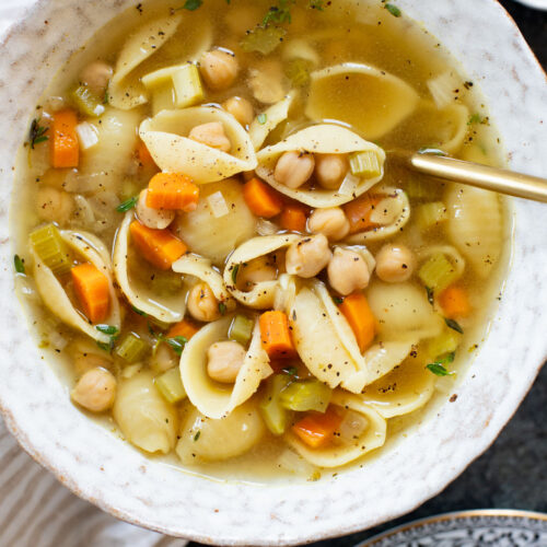 This Slow Cooker Chickpea Noodle Soup is comfort in a bowl. A vegan twist on chicken noodle soup...that tastes even better | ThisSavoryVegan.com
