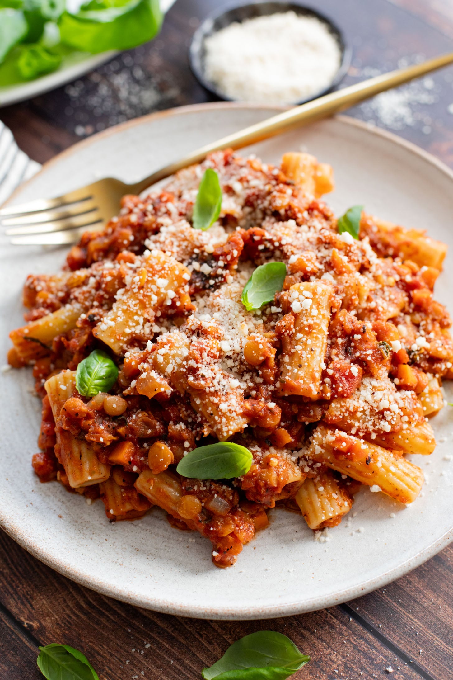 This Slow Cooker Lentil Bolognese is the perfect vegan Sunday sauce! Served over pasta for a delicious, protein-packed dinner idea | ThisSavoryVegan.com