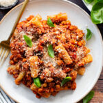 This Slow Cooker Lentil Bolognese is the perfect vegan Sunday sauce! Served over pasta for a delicious, protein-packed dinner idea | ThisSavoryVegan.com