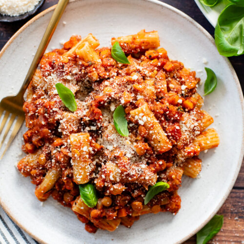 This Slow Cooker Lentil Bolognese is the perfect vegan Sunday sauce! Served over pasta for a delicious, protein-packed dinner idea | ThisSavoryVegan.com