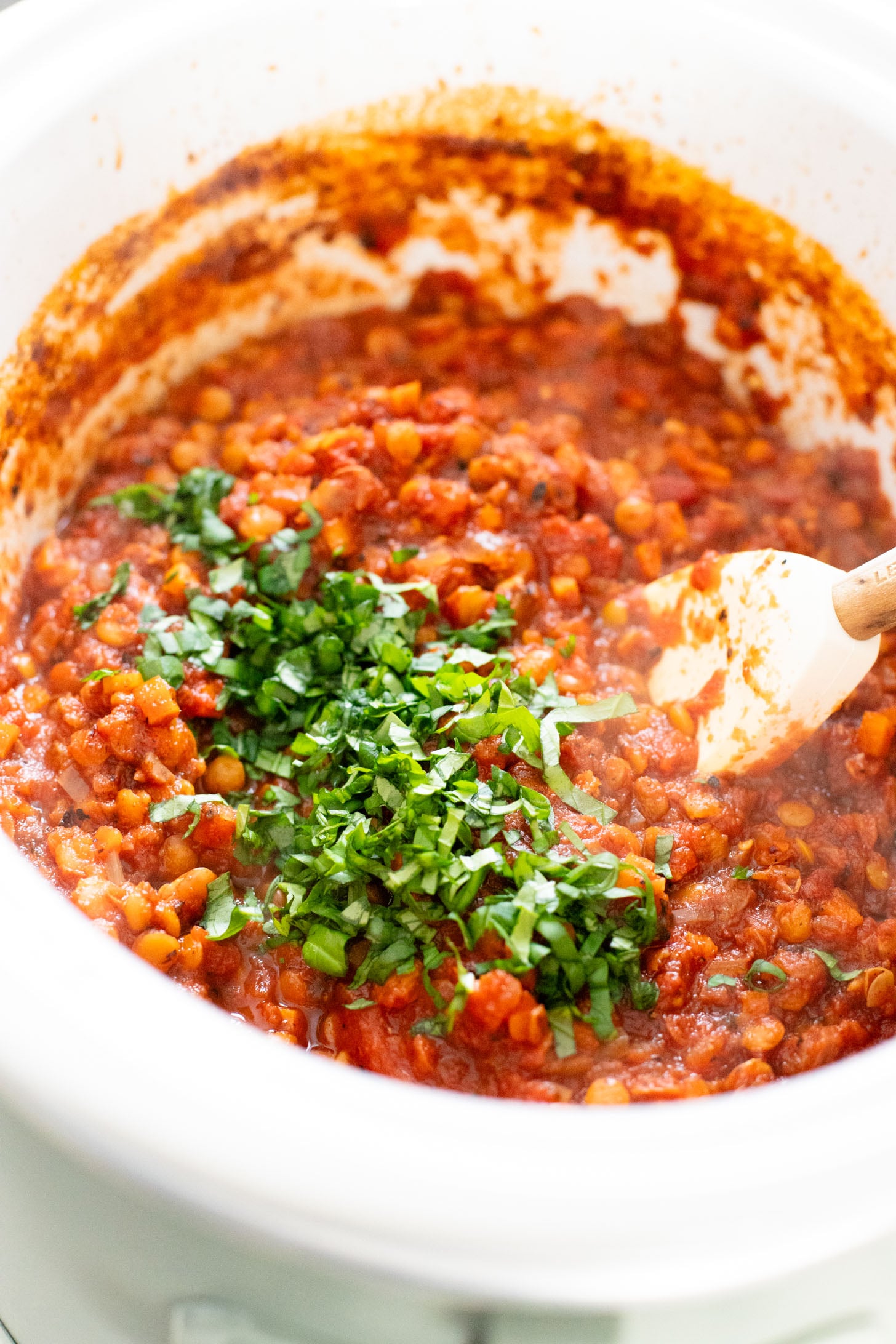 This Slow Cooker Lentil Bolognese is the perfect vegan Sunday sauce! Served over pasta for a delicious, protein-packed dinner idea | ThisSavoryVegan.com