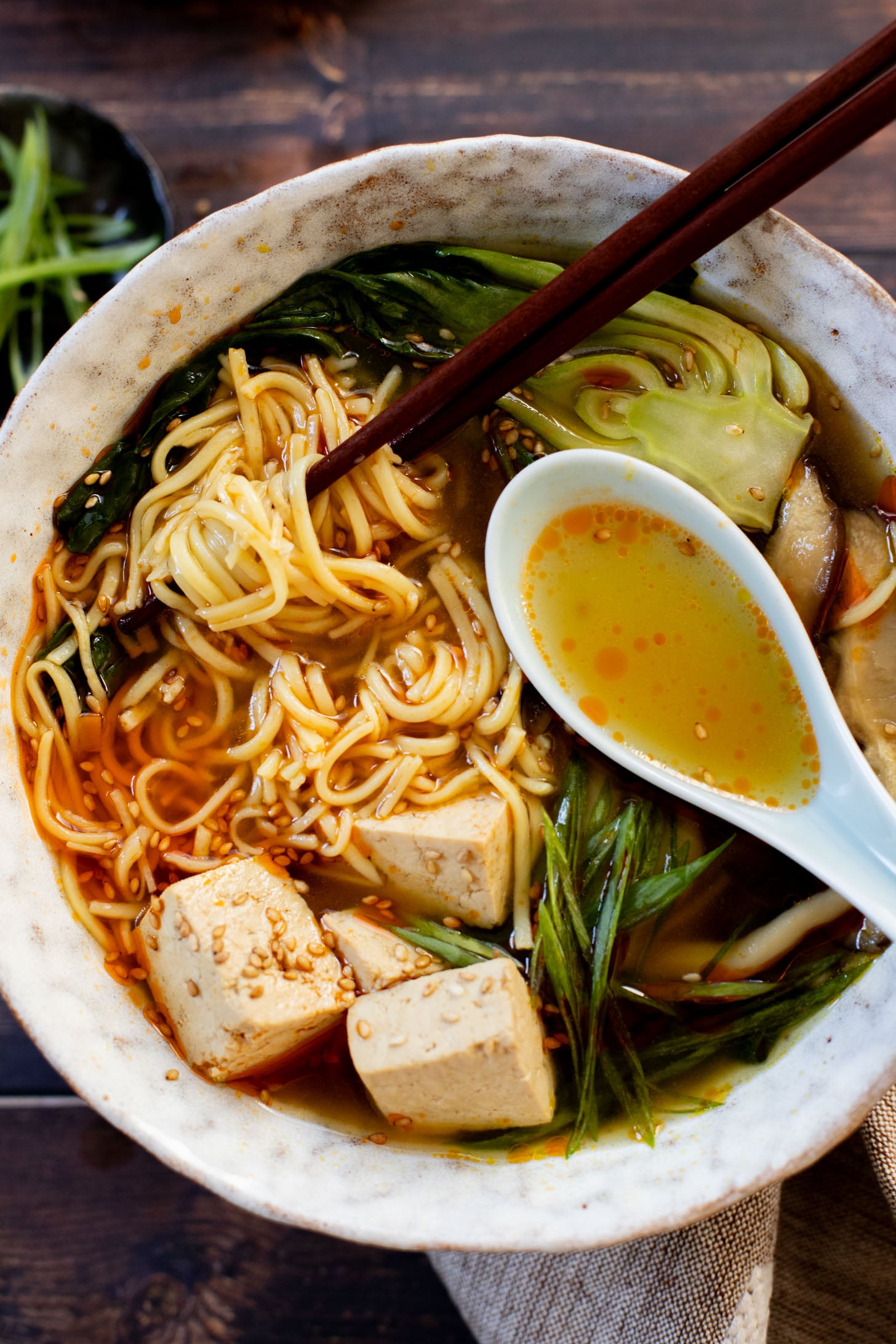 This Slow Cooker Vegan Ramen is a super easy way to make homemade ramen. Packed with veggies & tofu, this is a delicious dish | ThisSavoryVegan.com