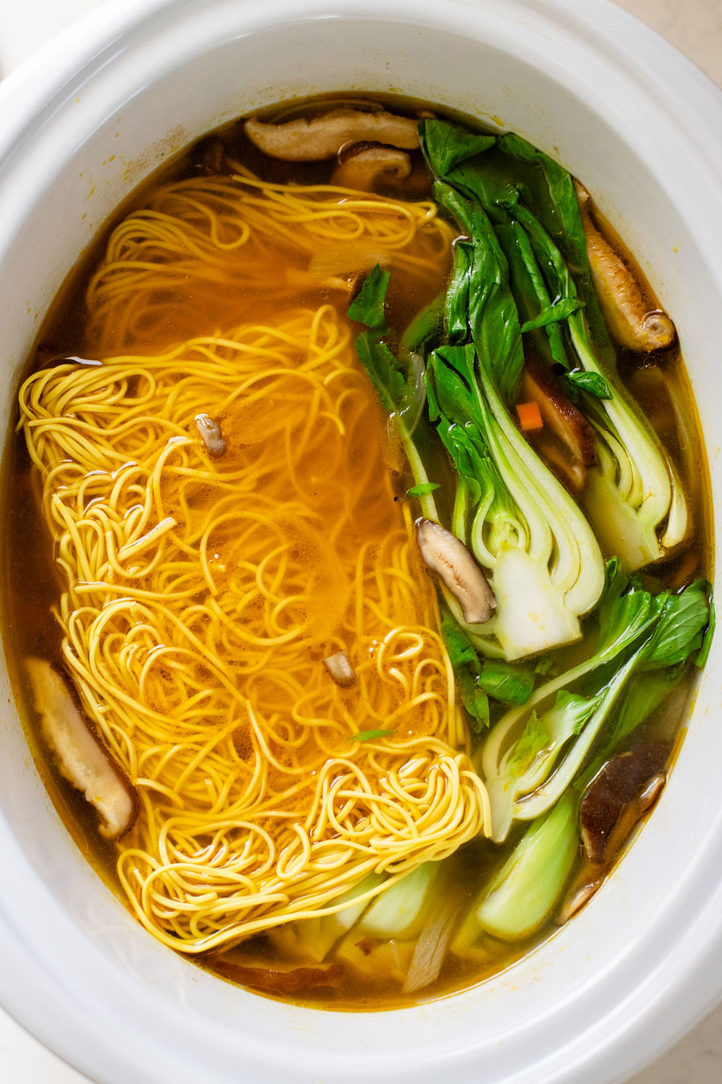 This Slow Cooker Vegan Ramen is a super easy way to make homemade ramen. Packed with veggies & tofu, this is a delicious dish | ThisSavoryVegan.com