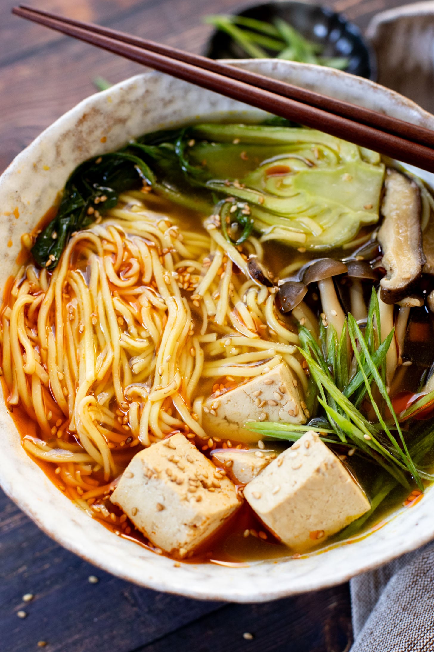 This Slow Cooker Vegan Ramen is a super easy way to make homemade ramen. Packed with veggies & tofu, this is a delicious dish | ThisSavoryVegan.com