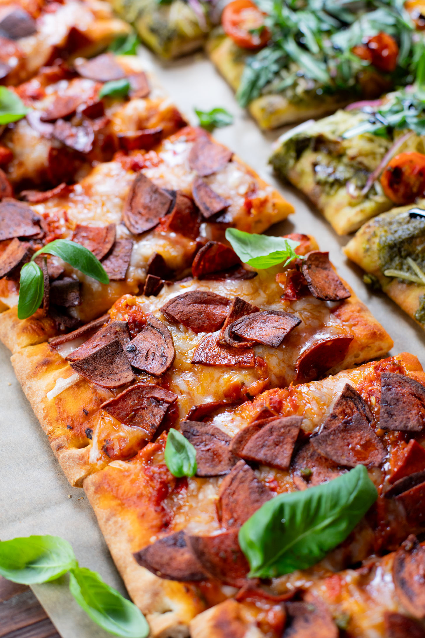 Trader Joe's Vegan Pizza 2 Ways - spicy vegan pepperoni pizza and pesto arugula pizza. Simple, delicious & easy | ThisSavoryVegan.com