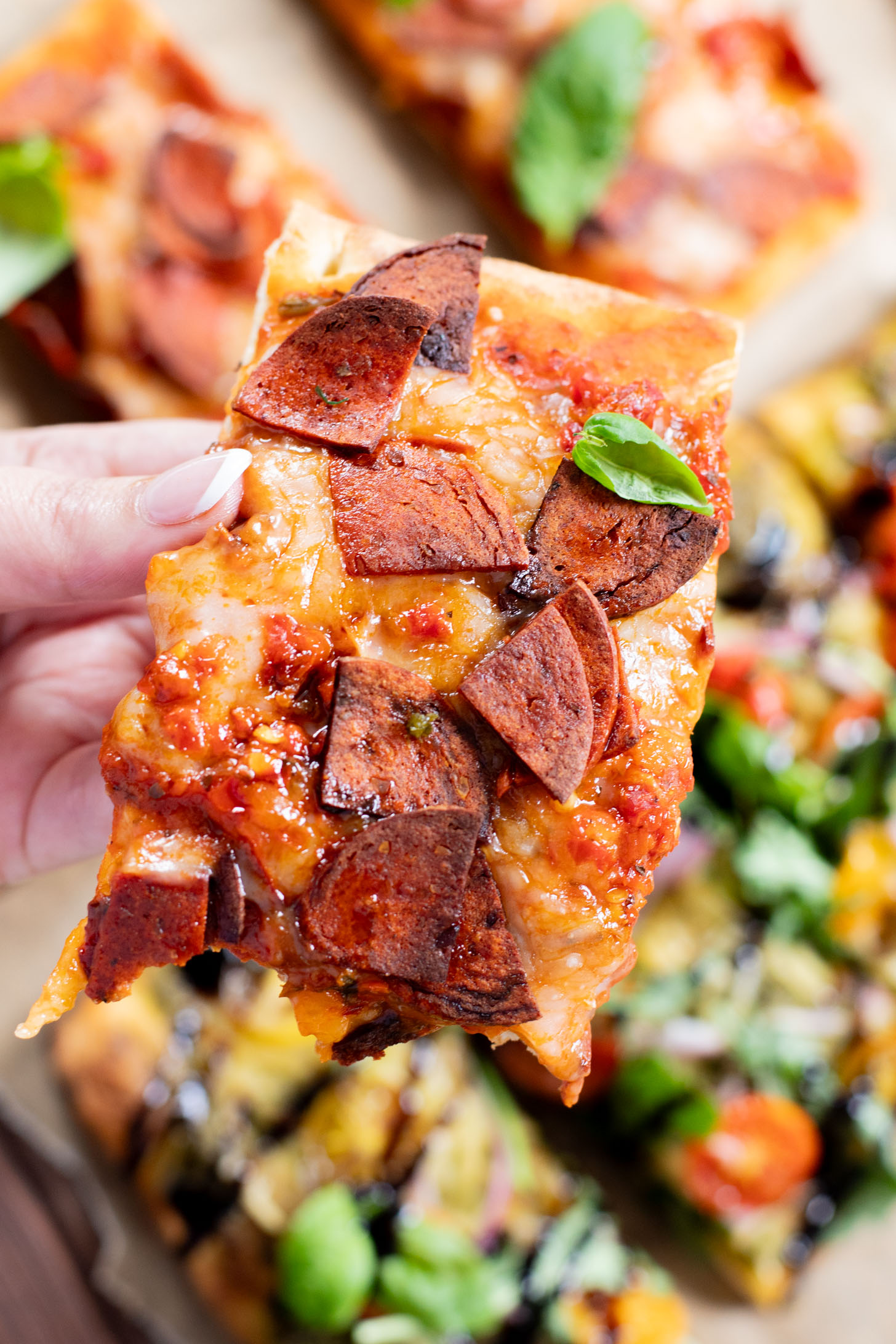 Trader Joe's Vegan Pizza 2 Ways - spicy vegan pepperoni pizza and pesto arugula pizza. Simple, delicious & easy | ThisSavoryVegan.com