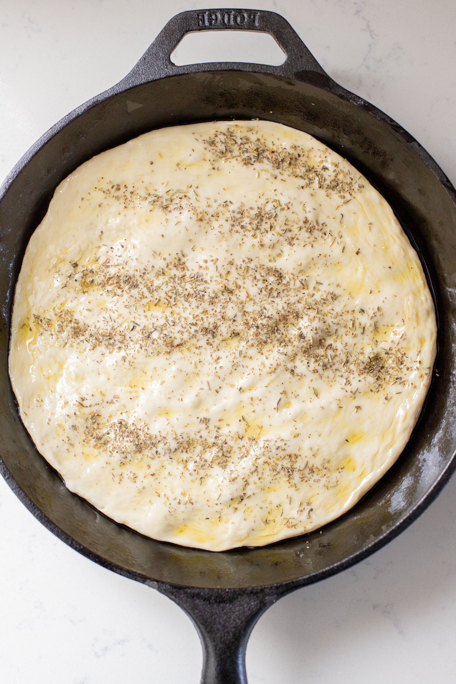 Thick crust, made in a cast iron skillet and extra cheesy. This Vegan Pepperoni Pan Pizza is 100% dairy-free and super delicious | ThisSavoryVegan.com