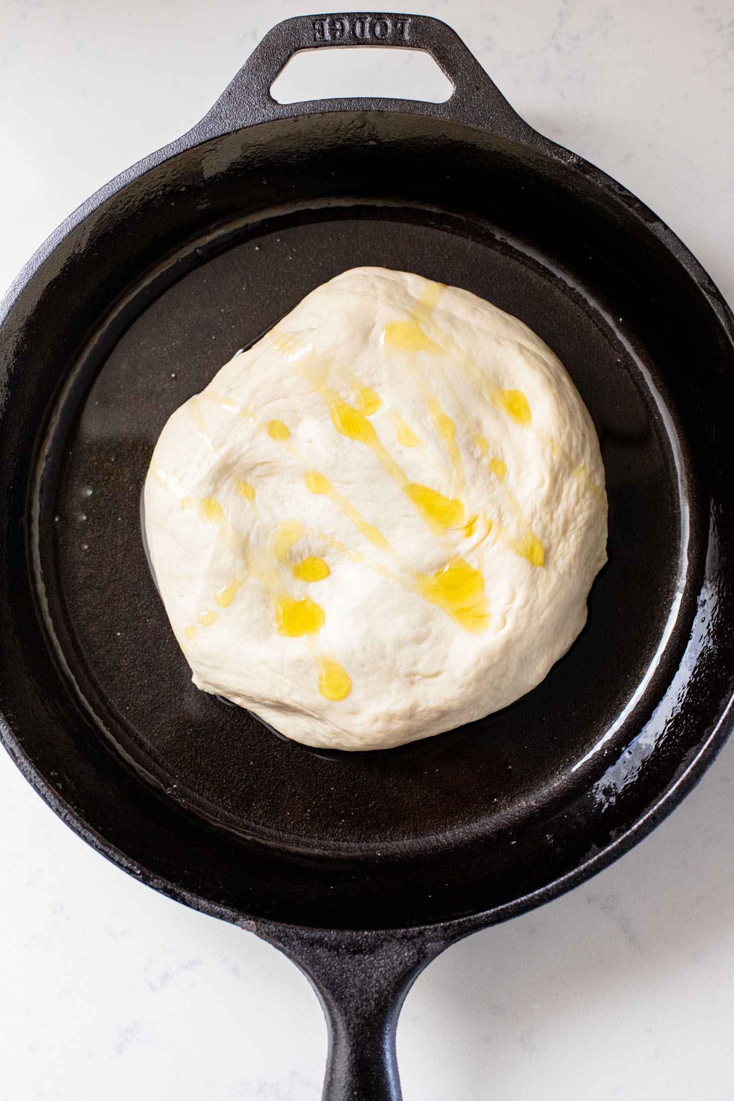 Thick crust, made in a cast iron skillet and extra cheesy. This Vegan Pepperoni Pan Pizza is 100% dairy-free and super delicious | ThisSavoryVegan.com