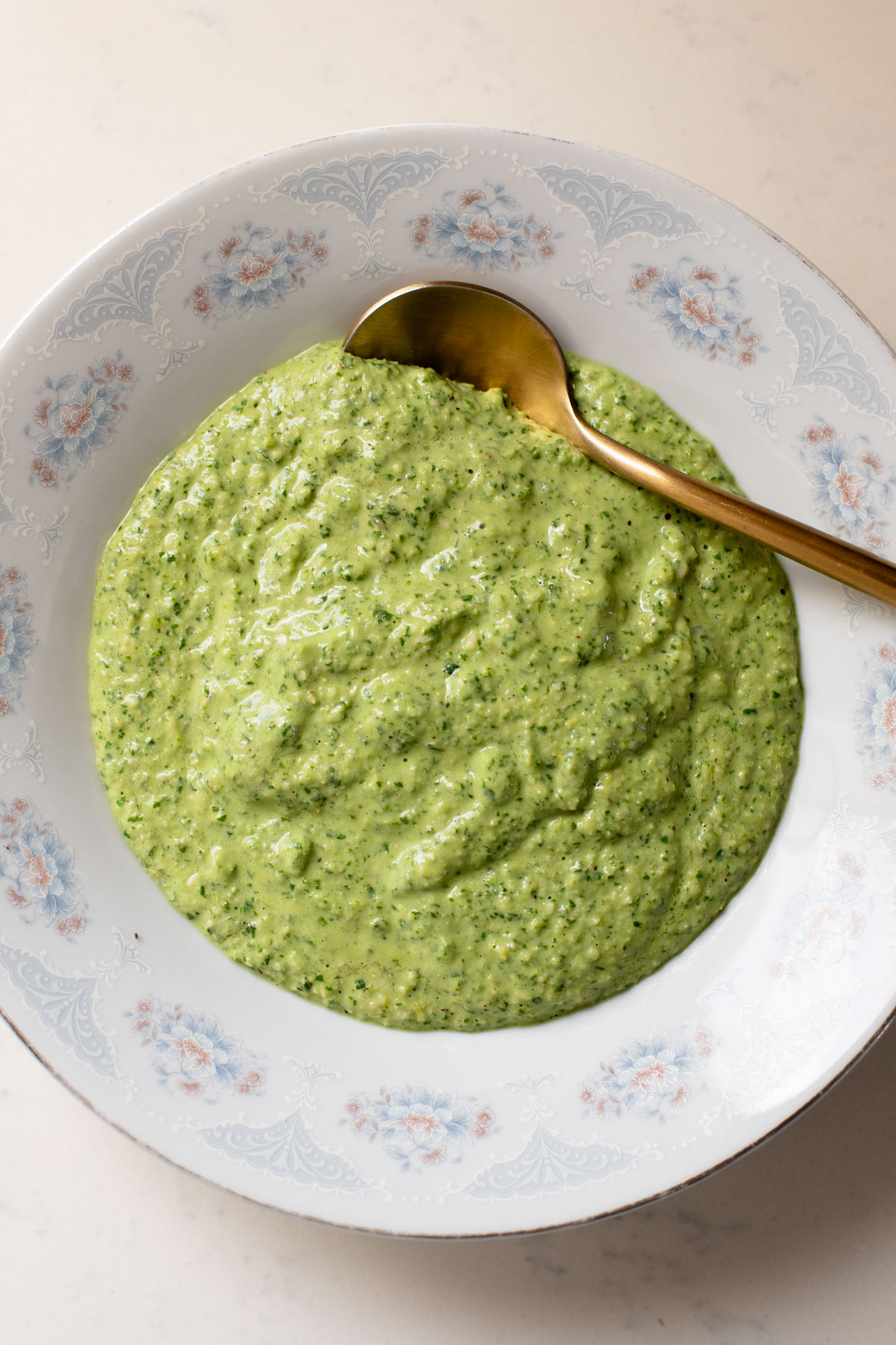 This Vegan Pesto Lasagna is layered with zucchini, spinach, lasagna noodles, tofu ricotta and a pesto béchamel sauce | ThisSavoryVegan.com