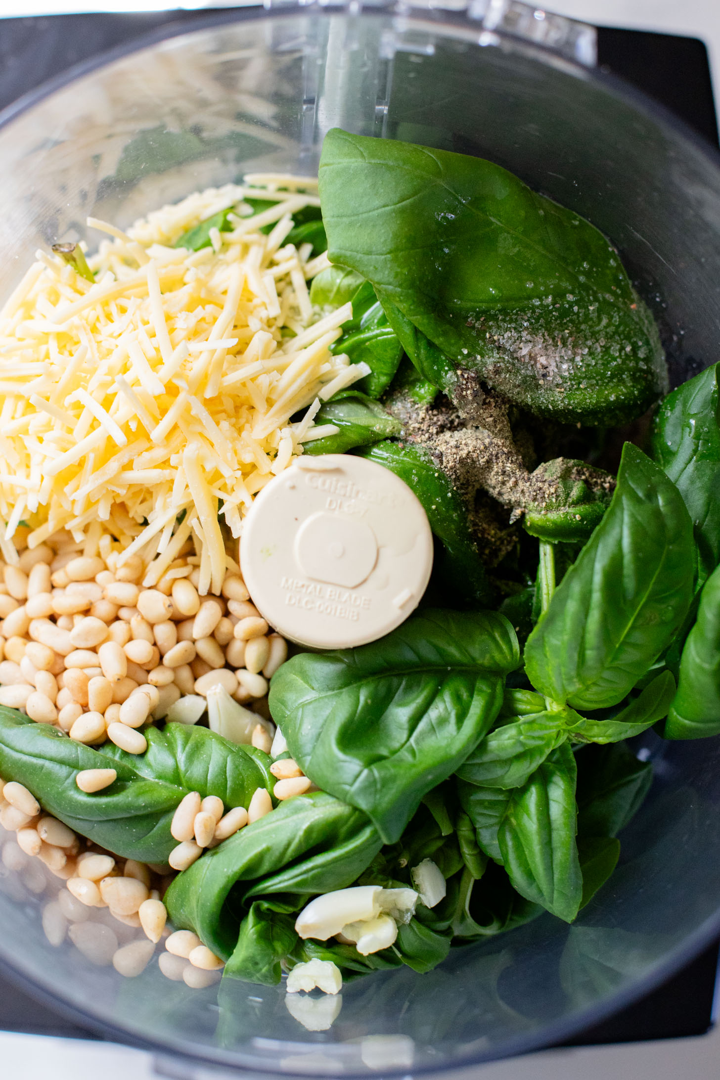 This Vegan Pesto Lasagna is layered with zucchini, spinach, lasagna noodles, tofu ricotta and a pesto béchamel sauce | ThisSavoryVegan.com