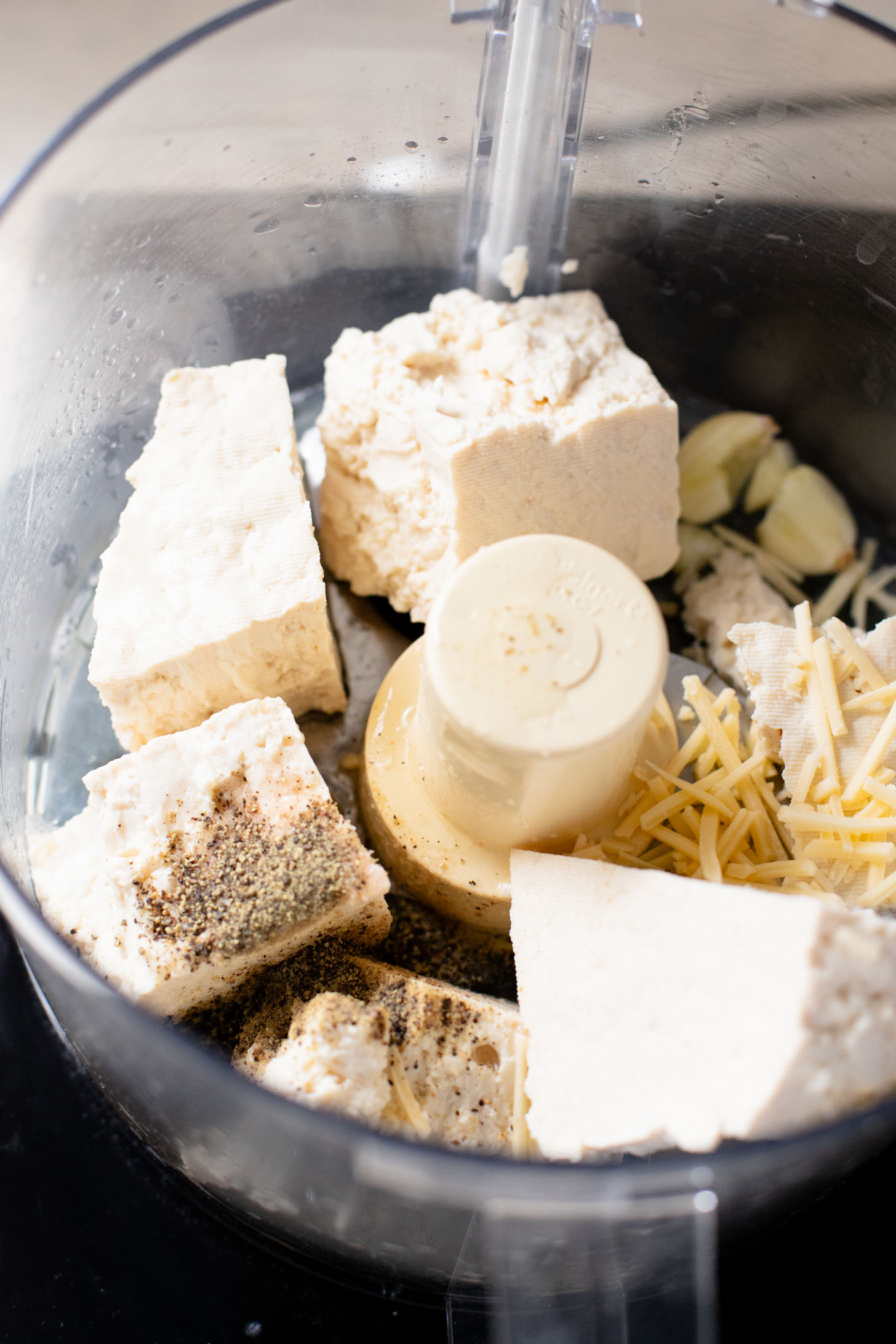 This Vegan Pesto Lasagna is layered with zucchini, spinach, lasagna noodles, tofu ricotta and a pesto béchamel sauce | ThisSavoryVegan.com