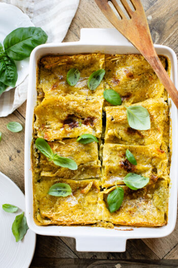 This Vegan Pesto Lasagna is layered with zucchini, spinach, lasagna noodles, tofu ricotta and a pesto béchamel sauce | ThisSavoryVegan.com