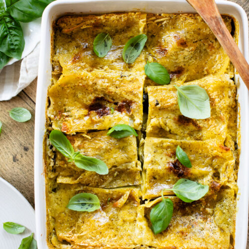 This Vegan Pesto Lasagna is layered with zucchini, spinach, lasagna noodles, tofu ricotta and a pesto béchamel sauce | ThisSavoryVegan.com