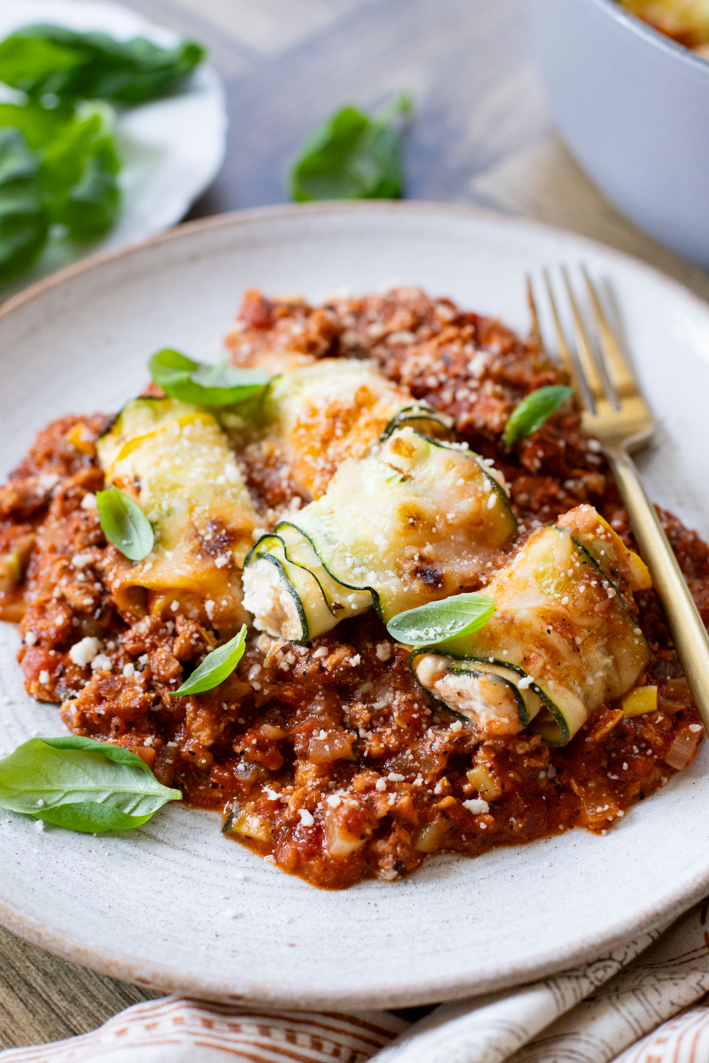 This Vegan Zucchini Involtini is perfect when you want pasta flavors without the carbs. Made with tofu ricotta & vegan sausage marinara | ThisSavoryVegan.com