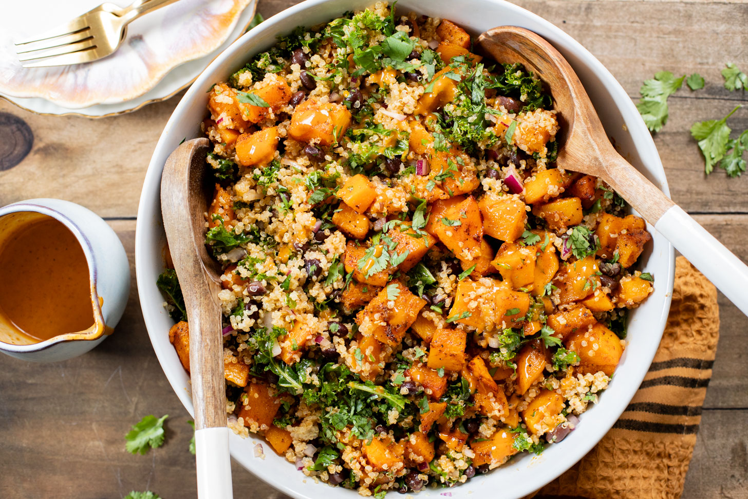 This Chipotle Butternut Squash Quinoa Salad is the perfect fall meal. Roasted squash, tender quinoa, black beans, kale & a chipotle dressing | ThisSavoryVegan.com