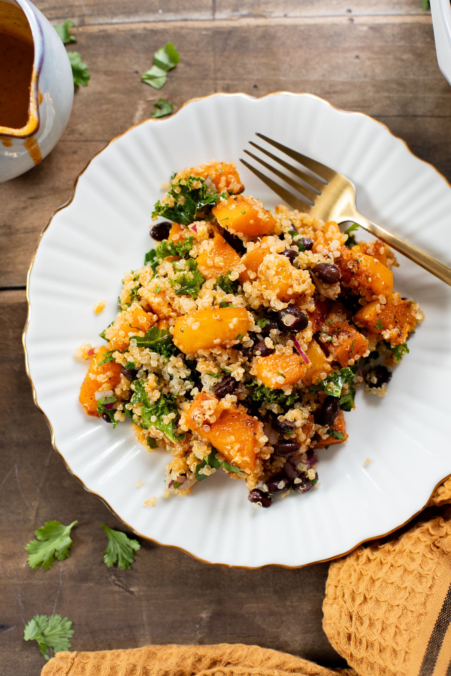 This Chipotle Butternut Squash Quinoa Salad is the perfect fall meal. Roasted squash, tender quinoa, black beans, kale & a chipotle dressing | ThisSavoryVegan.com