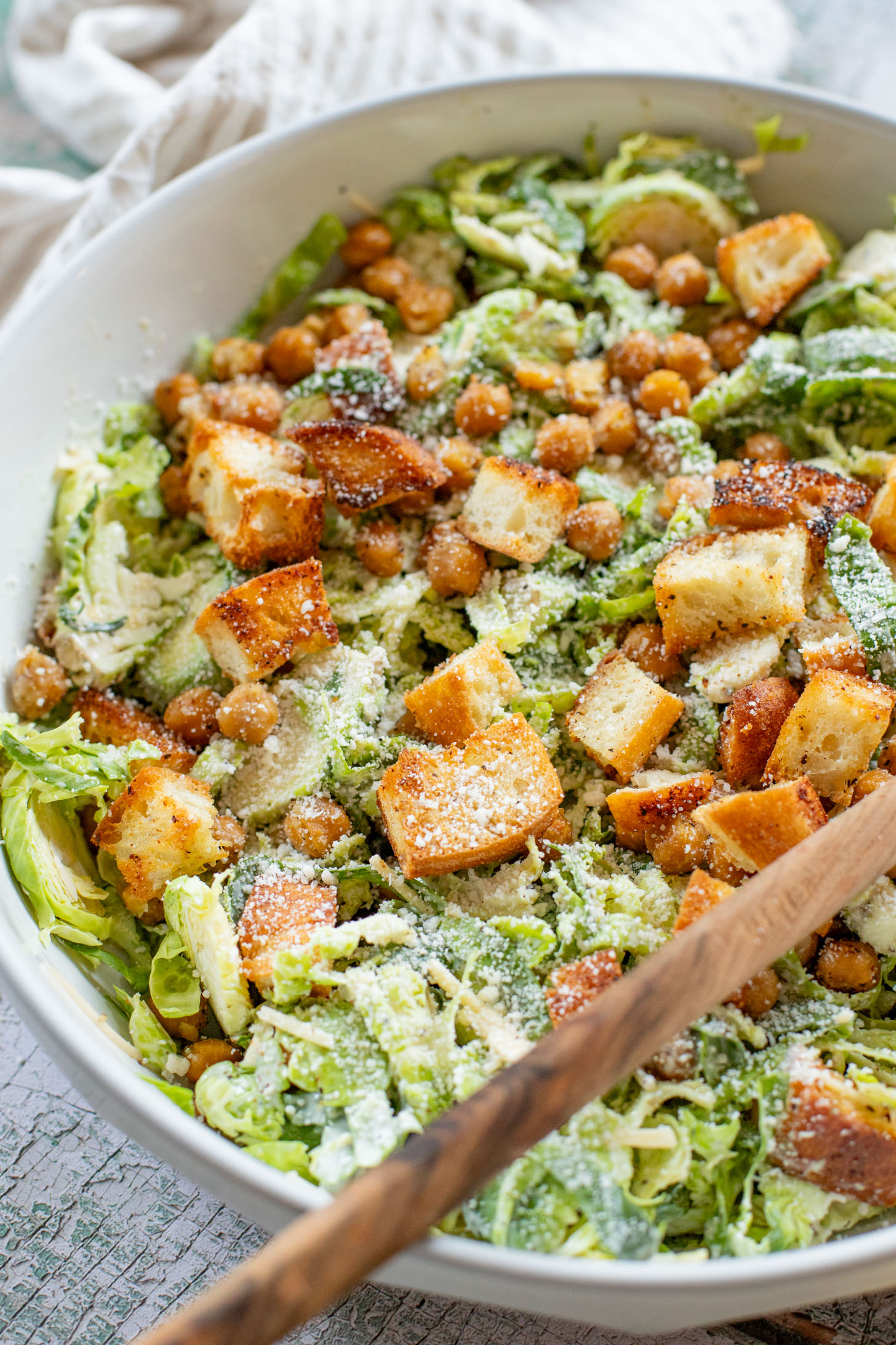 This Shaved Brussels Sprouts Caesar Salad is 100% dairy-free and totally tasty! A fall take on a classic salad recipe | ThisSavoryVegan.com