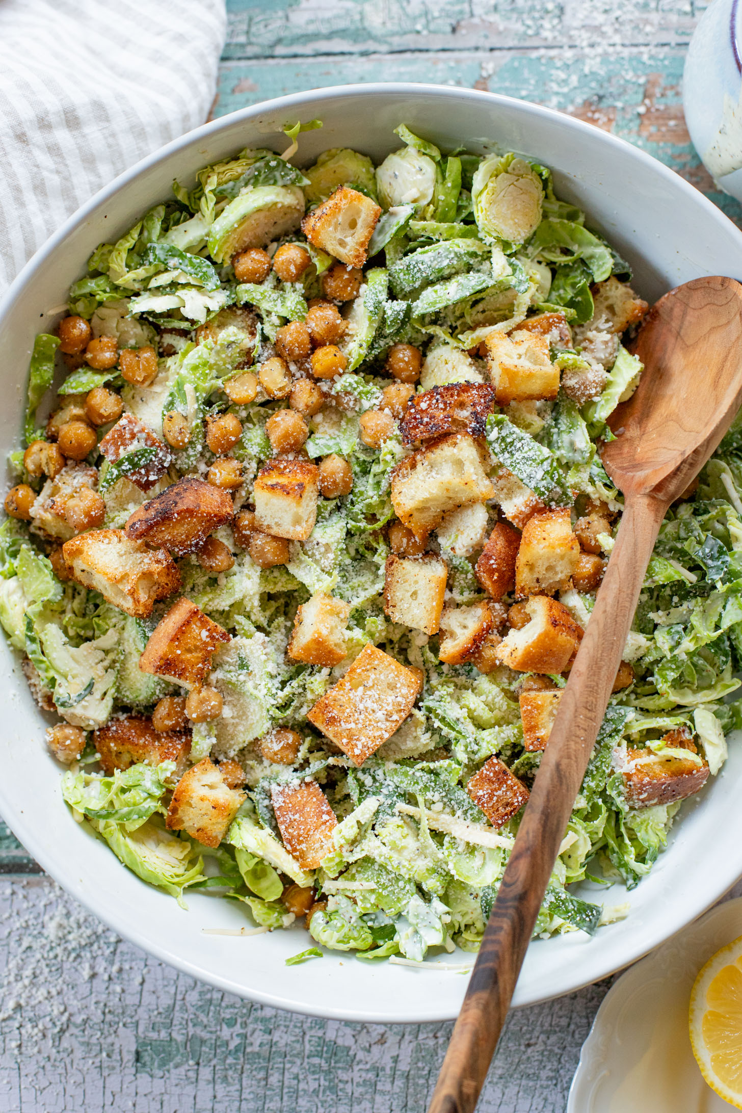 This Shaved Brussels Sprouts Caesar Salad is 100% dairy-free and totally tasty! A fall take on a classic salad recipe | ThisSavoryVegan.com