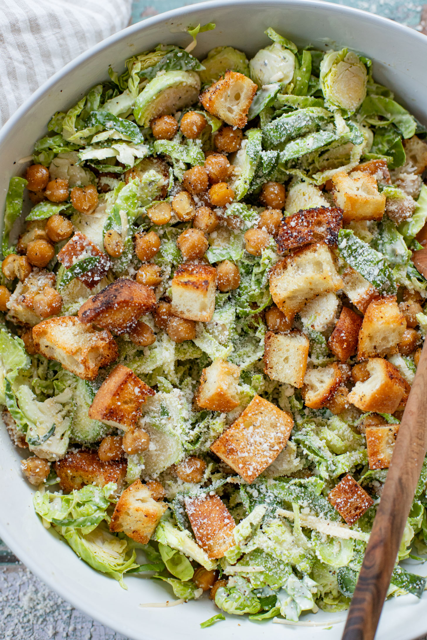 This Shaved Brussels Sprouts Caesar Salad is 100% dairy-free and totally tasty! A fall take on a classic salad recipe | ThisSavoryVegan.com