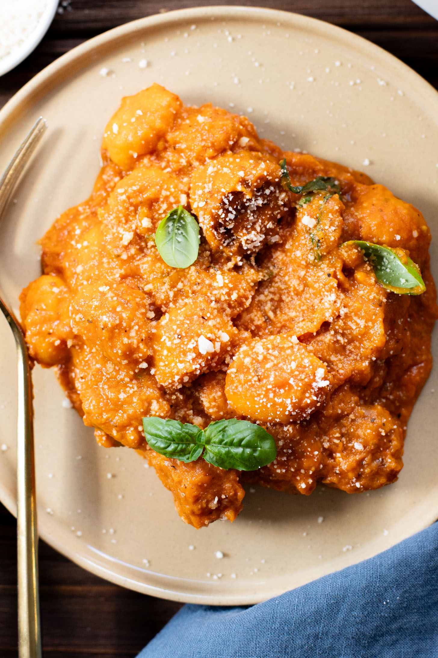 This Creamy Pumpkin Gnocchi with Vegan Sausage is an easy skillet dinner that is perfect for a cozy, fall meal at home | ThisSavoryVegan.com