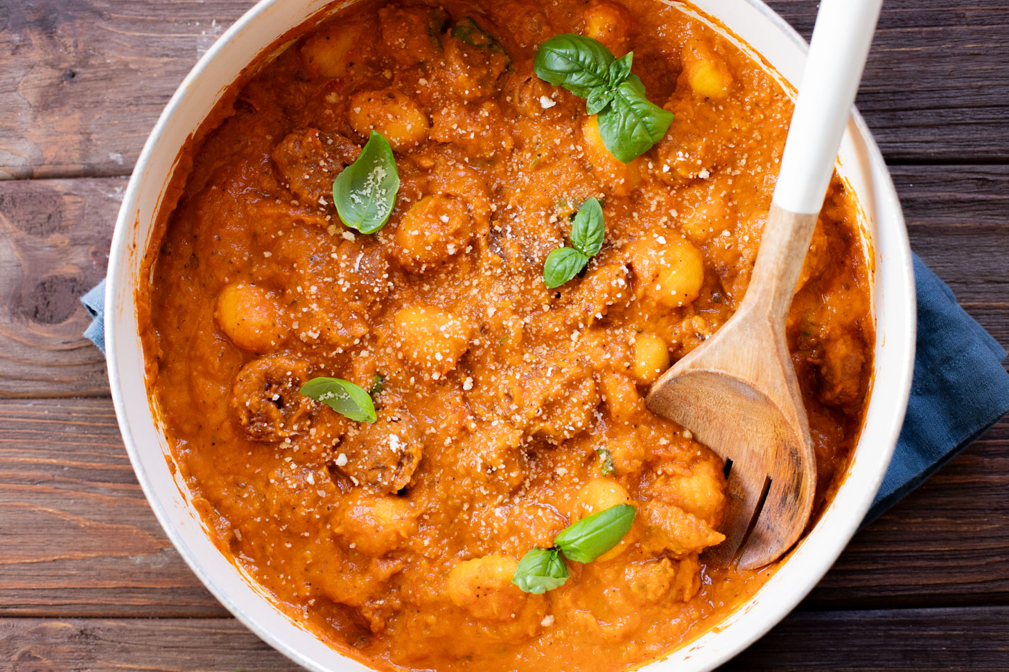 This Creamy Pumpkin Gnocchi with Vegan Sausage is an easy skillet dinner that is perfect for a cozy, fall meal at home | ThisSavoryVegan.com