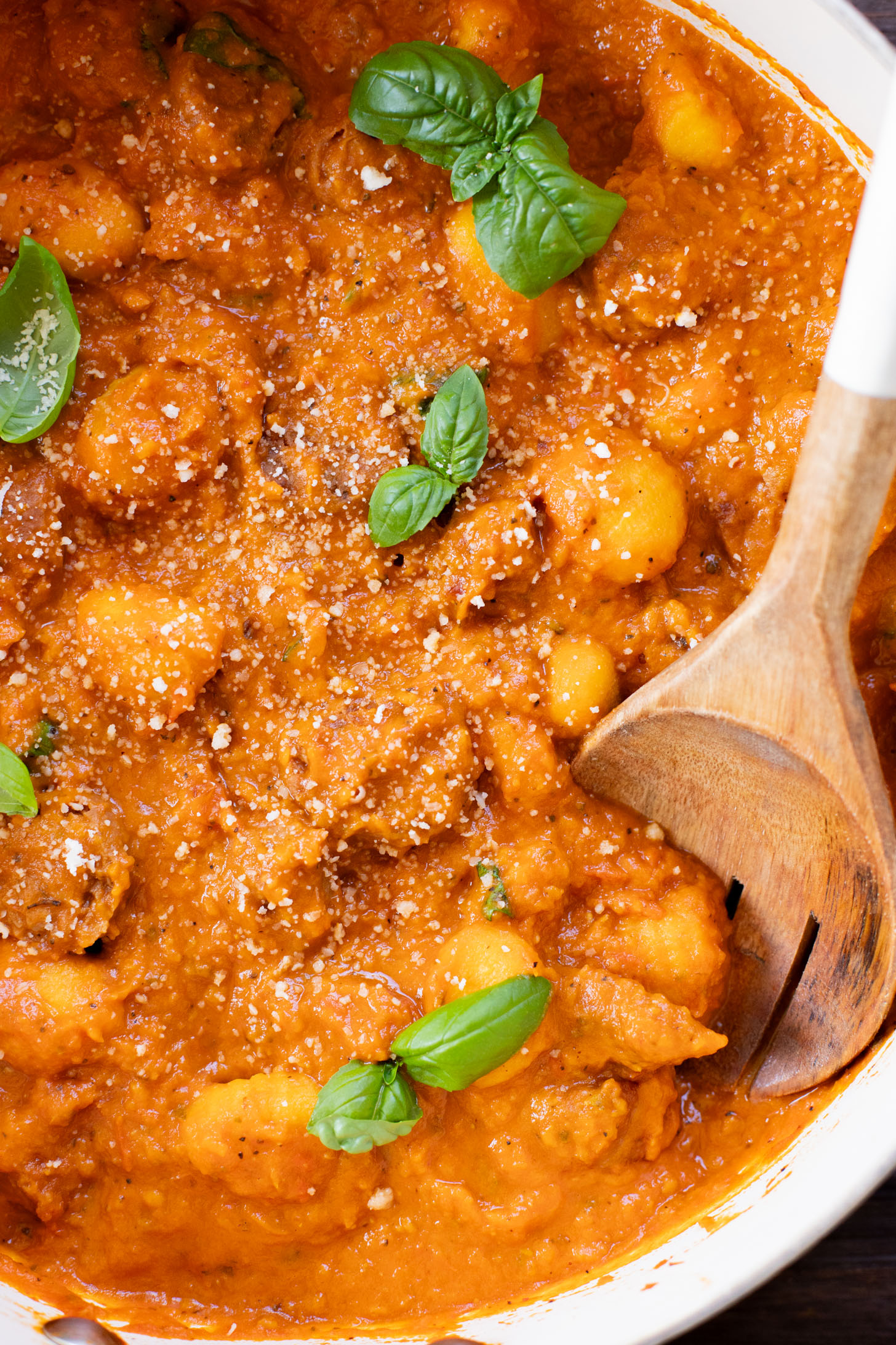 This Creamy Pumpkin Gnocchi with Vegan Sausage is an easy skillet dinner that is perfect for a cozy, fall meal at home | ThisSavoryVegan.com