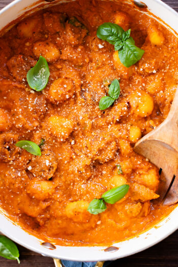 This Creamy Pumpkin Gnocchi with Vegan Sausage is an easy skillet dinner that is perfect for a cozy, fall meal at home | ThisSavoryVegan.com