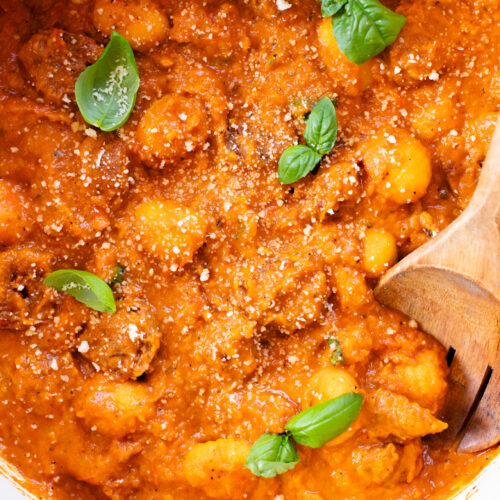 This Creamy Pumpkin Gnocchi with Vegan Sausage is an easy skillet dinner that is perfect for a cozy, fall meal at home | ThisSavoryVegan.com