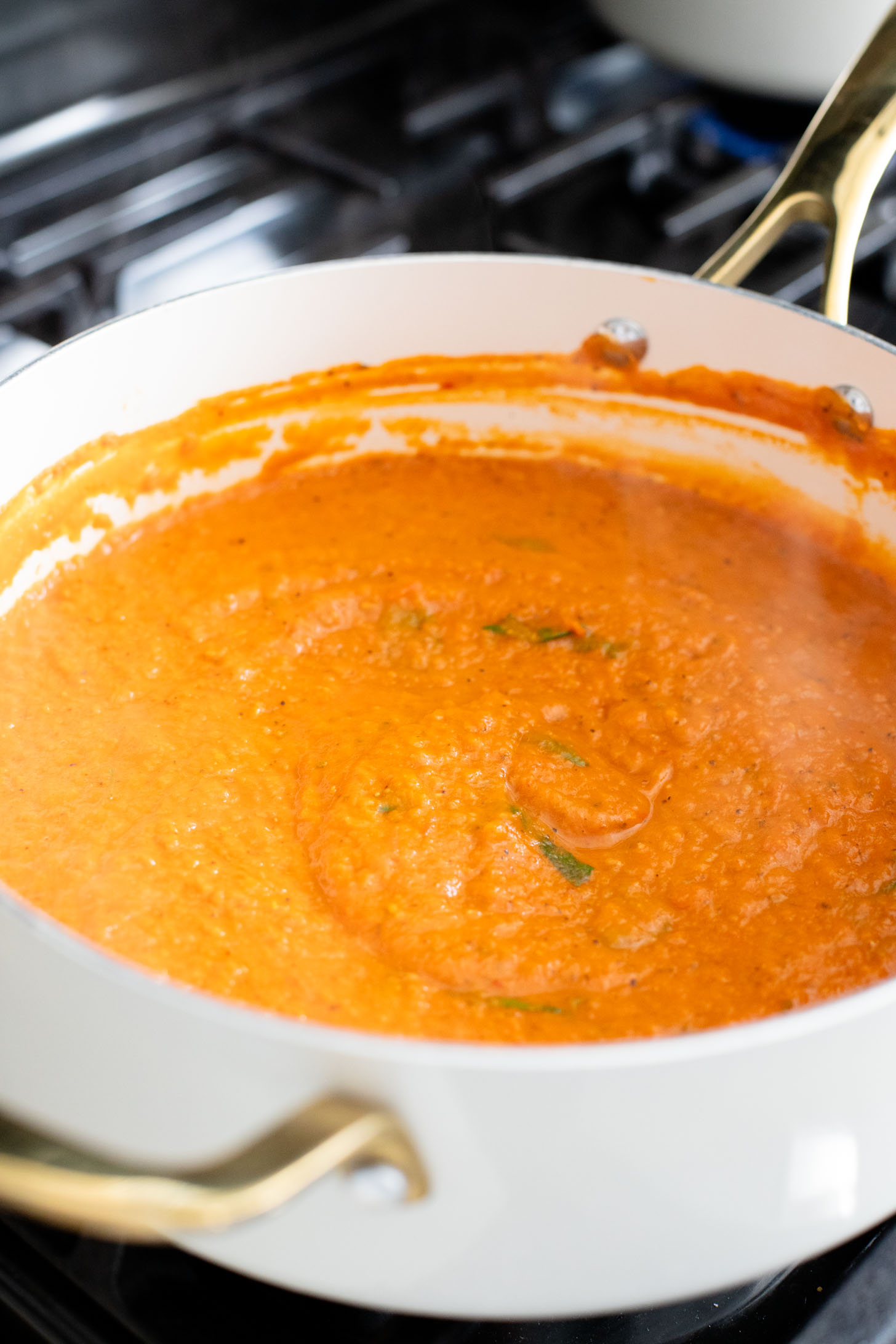 This Creamy Pumpkin Gnocchi with Vegan Sausage is an easy skillet dinner that is perfect for a cozy, fall meal at home | ThisSavoryVegan.com