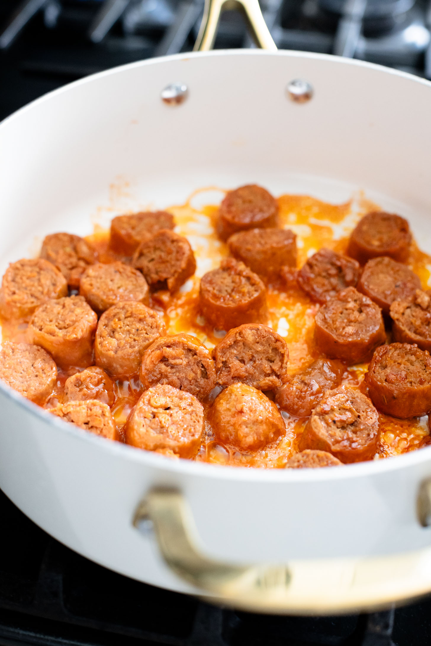 This Creamy Pumpkin Gnocchi with Vegan Sausage is an easy skillet dinner that is perfect for a cozy, fall meal at home | ThisSavoryVegan.com