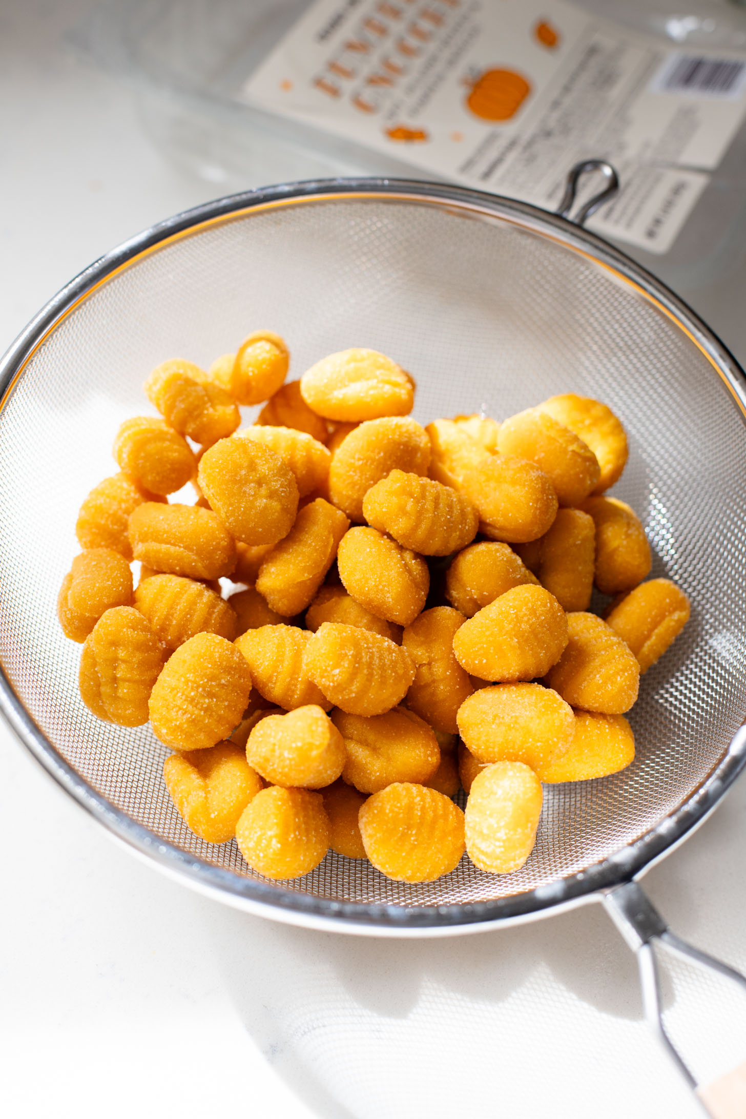 This Creamy Pumpkin Gnocchi with Vegan Sausage is an easy skillet dinner that is perfect for a cozy, fall meal at home | ThisSavoryVegan.com