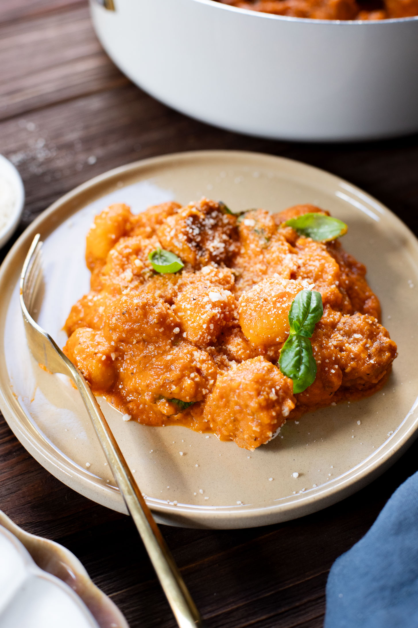 This Creamy Pumpkin Gnocchi with Vegan Sausage is an easy skillet dinner that is perfect for a cozy, fall meal at home | ThisSavoryVegan.com