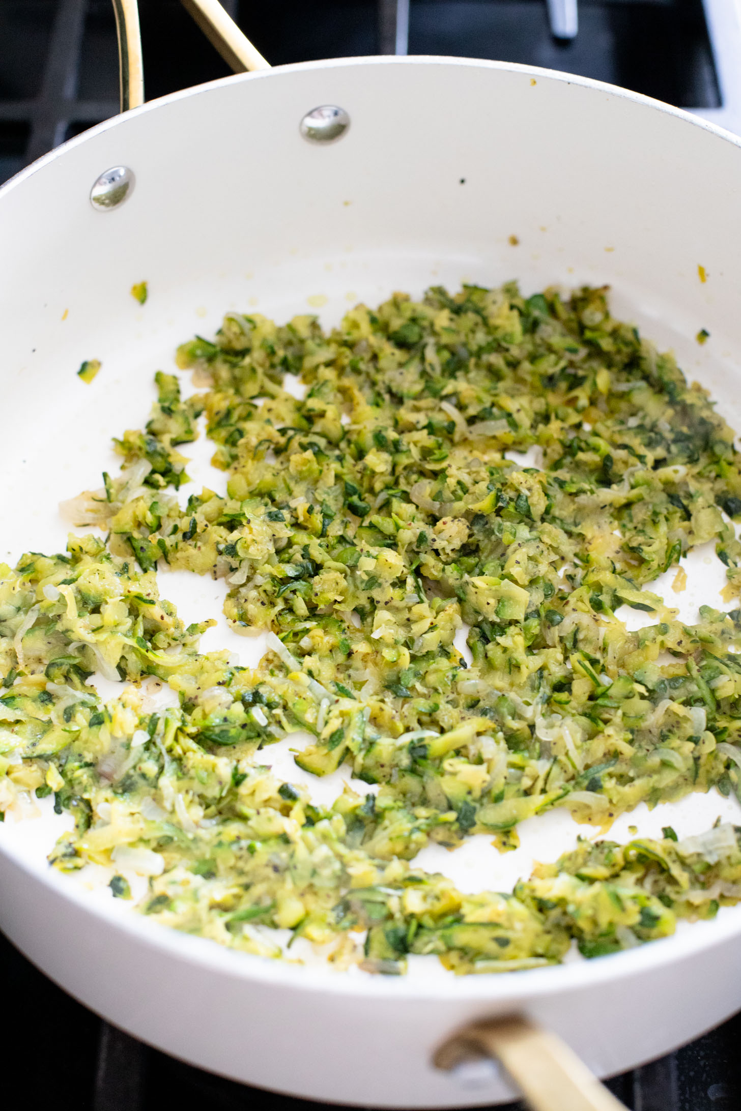 This Lemon Zucchini Bucatini is a simple vegan pasta dish that is creamy, loaded with veggies & 100% dairy-free | ThisSavoryVegan.com