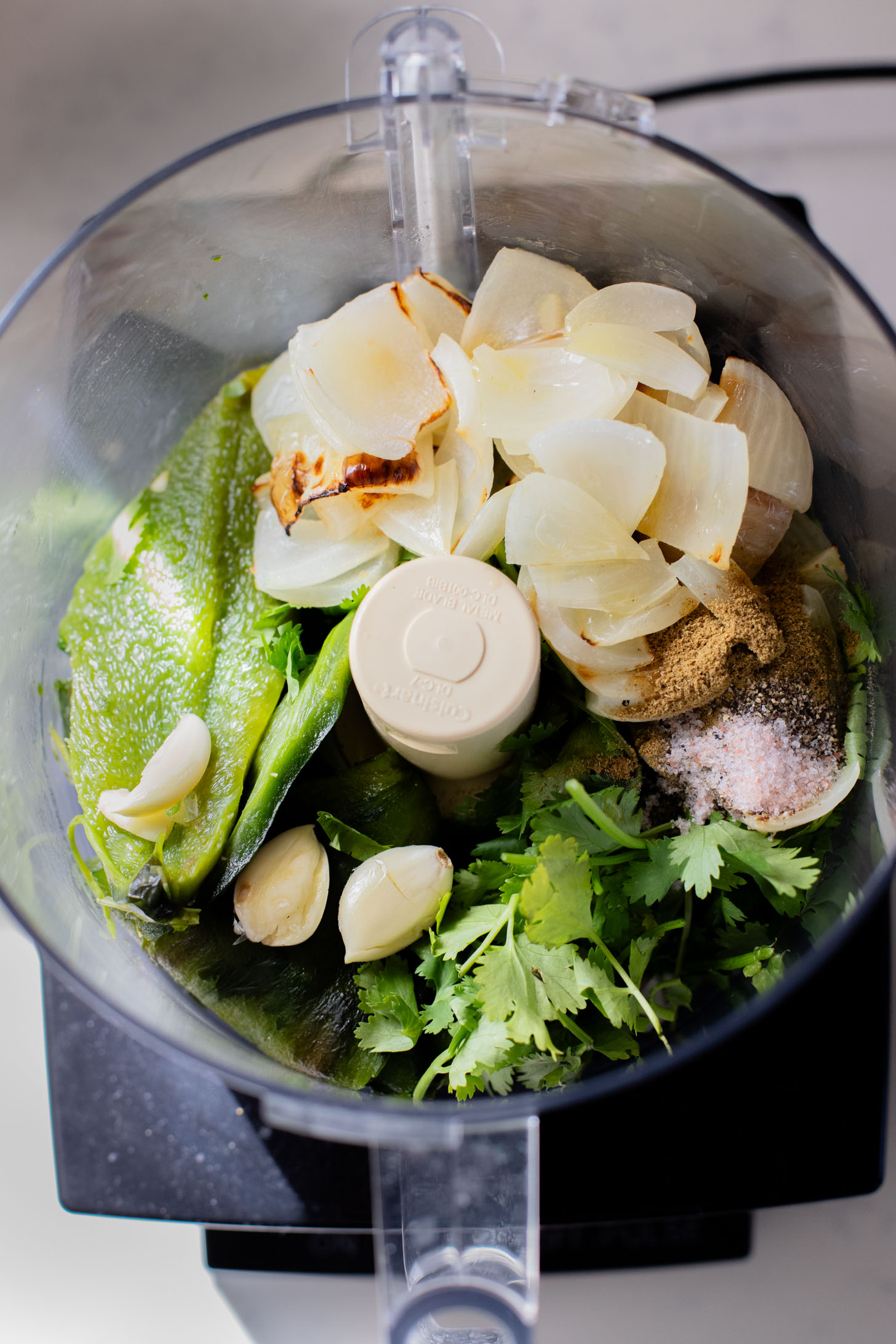This Roasted Cauliflower in Poblano Sauce is a complete vegan dinner. Filled with lentils, crispy cauliflower & the best poblano sauce | ThisSavoryVegan.com