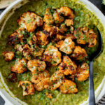 This Roasted Cauliflower in Poblano Sauce is a complete vegan dinner. Filled with lentils, crispy cauliflower & the best poblano sauce | ThisSavoryVegan.com