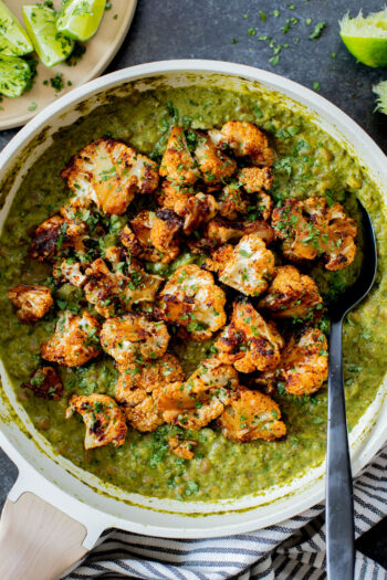 This Roasted Cauliflower in Poblano Sauce is a complete vegan dinner. Filled with lentils, crispy cauliflower & the best poblano sauce | ThisSavoryVegan.com