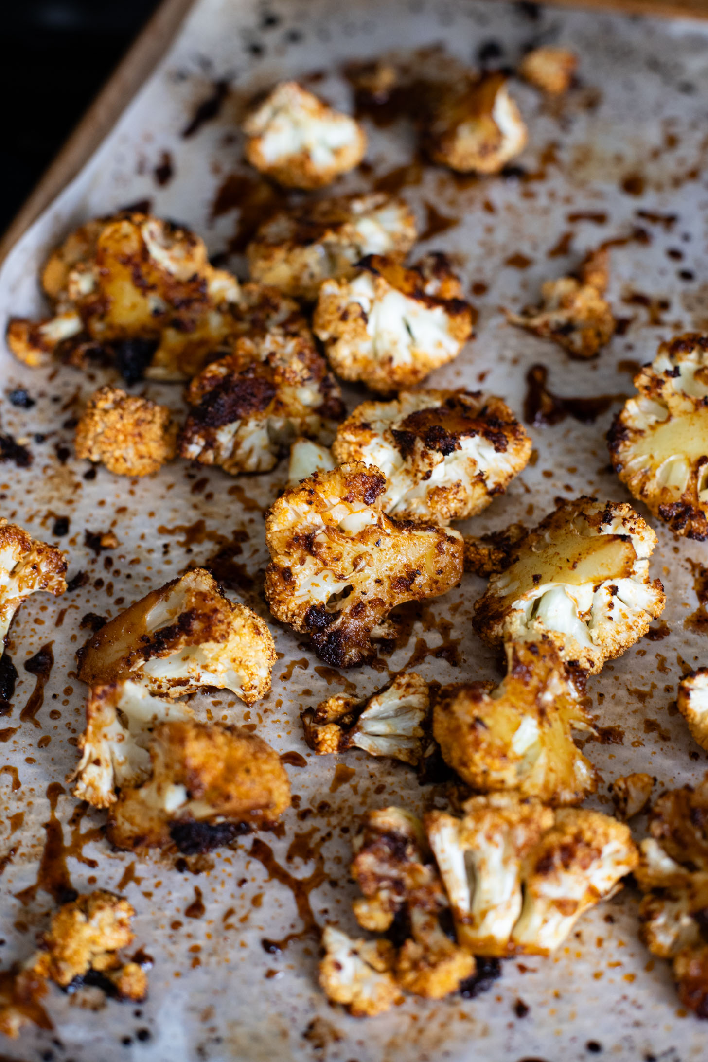 This Roasted Cauliflower in Poblano Sauce is a complete vegan dinner. Filled with lentils, crispy cauliflower & the best poblano sauce | ThisSavoryVegan.com