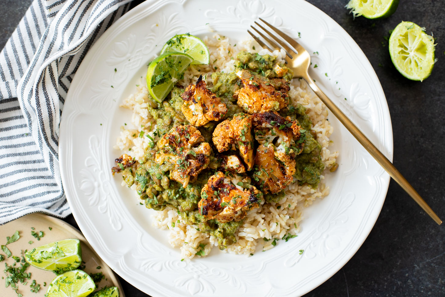 This Roasted Cauliflower in Poblano Sauce is a complete vegan dinner. Filled with lentils, crispy cauliflower & the best poblano sauce | ThisSavoryVegan.com