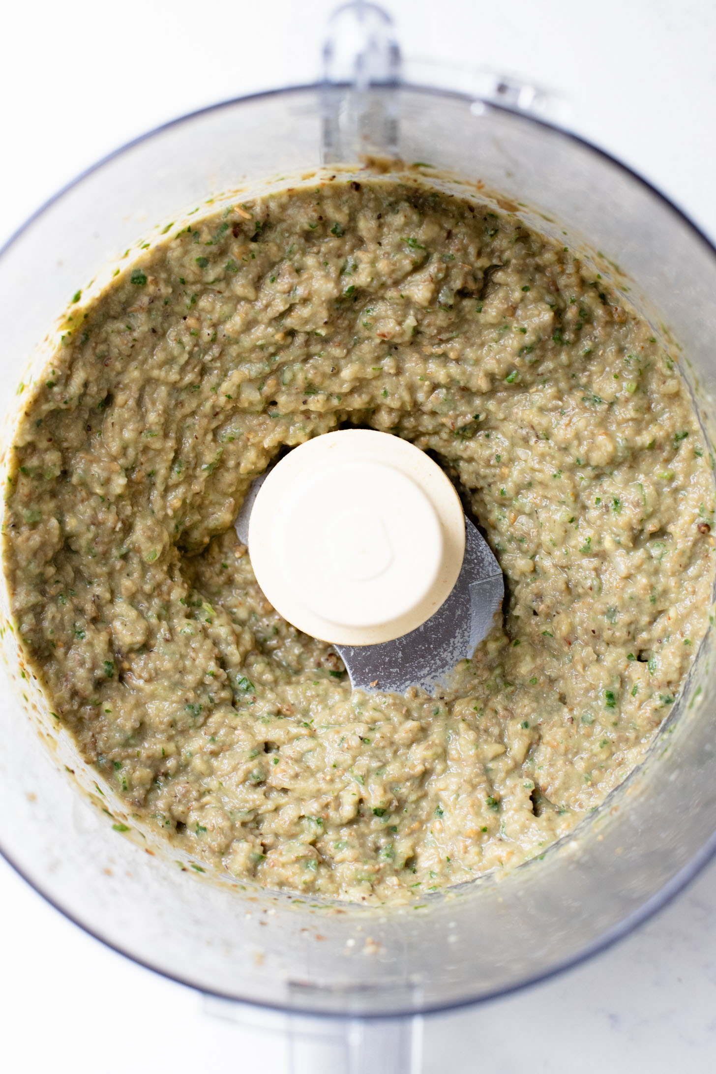 This Yummy Baked Eggplant Meatballs recipe is one of my favorite ways to make vegan meatballs. Tender "meatballs" in a tasty marinara sauce | ThisSavoryVegan.com