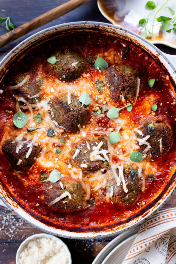 This Yummy Baked Eggplant Meatballs recipe is one of my favorite ways to make vegan meatballs. Tender "meatballs" in a tasty marinara sauce | ThisSavoryVegan.com
