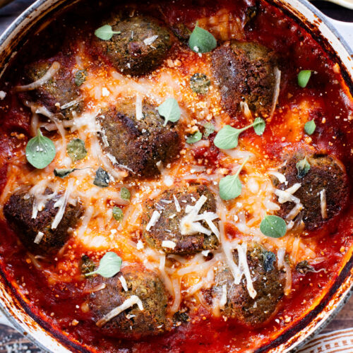 This Yummy Baked Eggplant Meatballs recipe is one of my favorite ways to make vegan meatballs. Tender "meatballs" in a tasty marinara sauce | ThisSavoryVegan.com