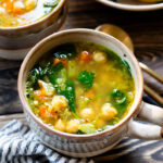 This Chickpea & Quinoa Lemon Soup is a healthy, light and tasty vegan soup recipe. Filled with veggies, chickpeas, quinoa & delicious broth | ThisSavoryVegan.com