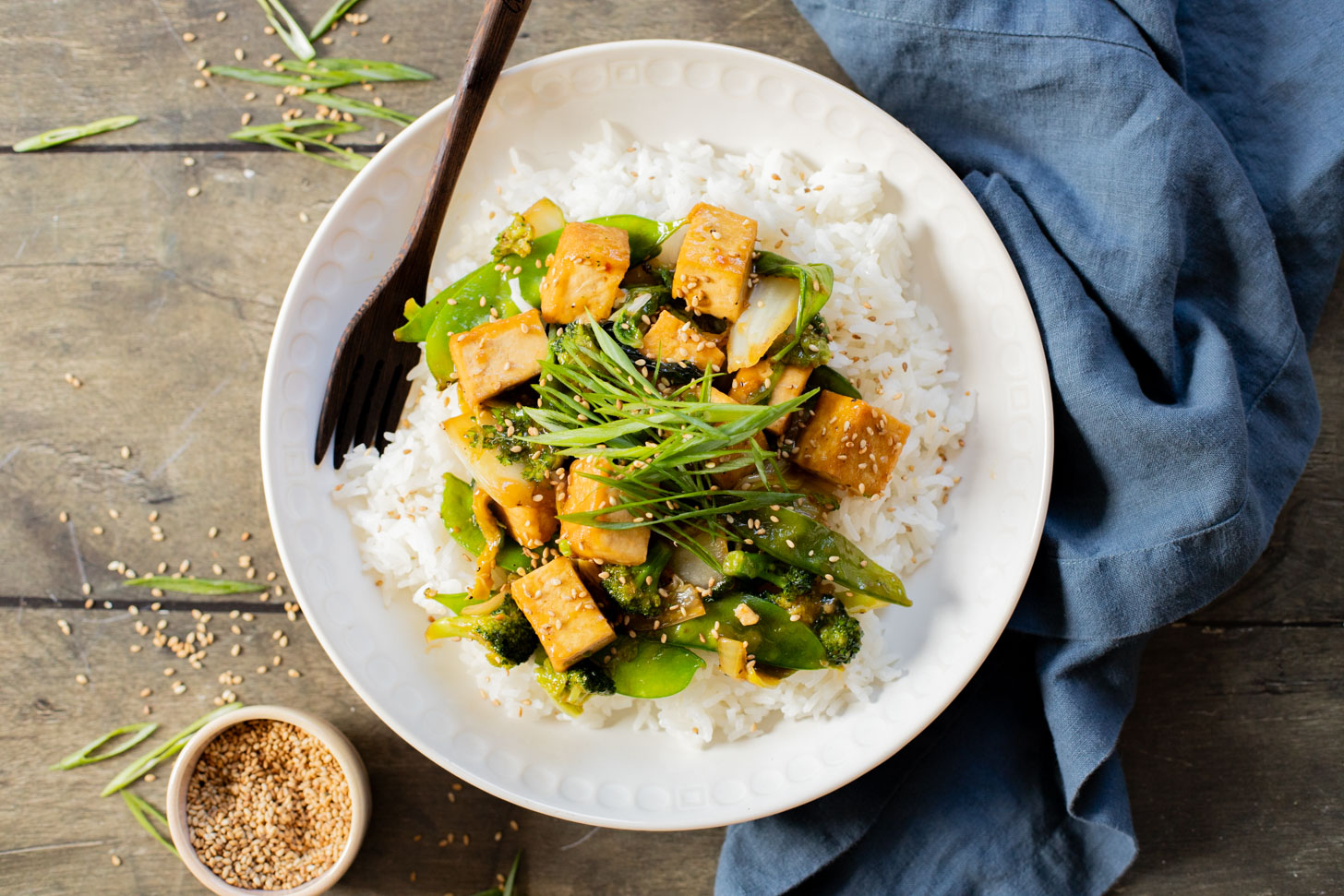 This Trader Joe's 20-Minute Tofu Stir-Fry is a simple and delicious vegan dinner idea. Made in one skillet and packed with veggies & protein | ThisSavoryVegan.com