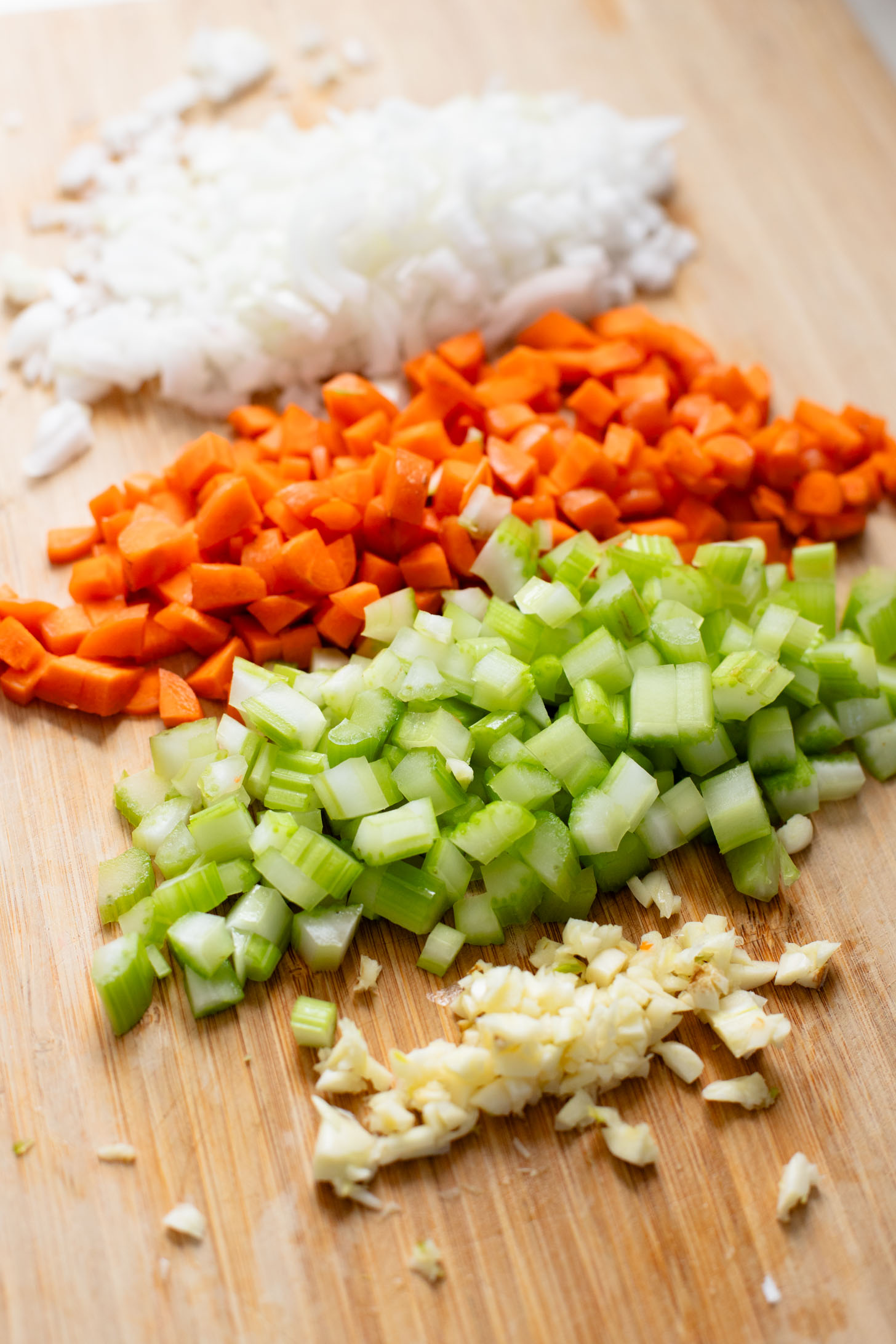 This Chickpea Pesto Macaroni Soup is a quick and tasty vegan soup recipe. A tasty broth, tender macaroni, chickpeas & veggies | ThisSavoryVegan.com