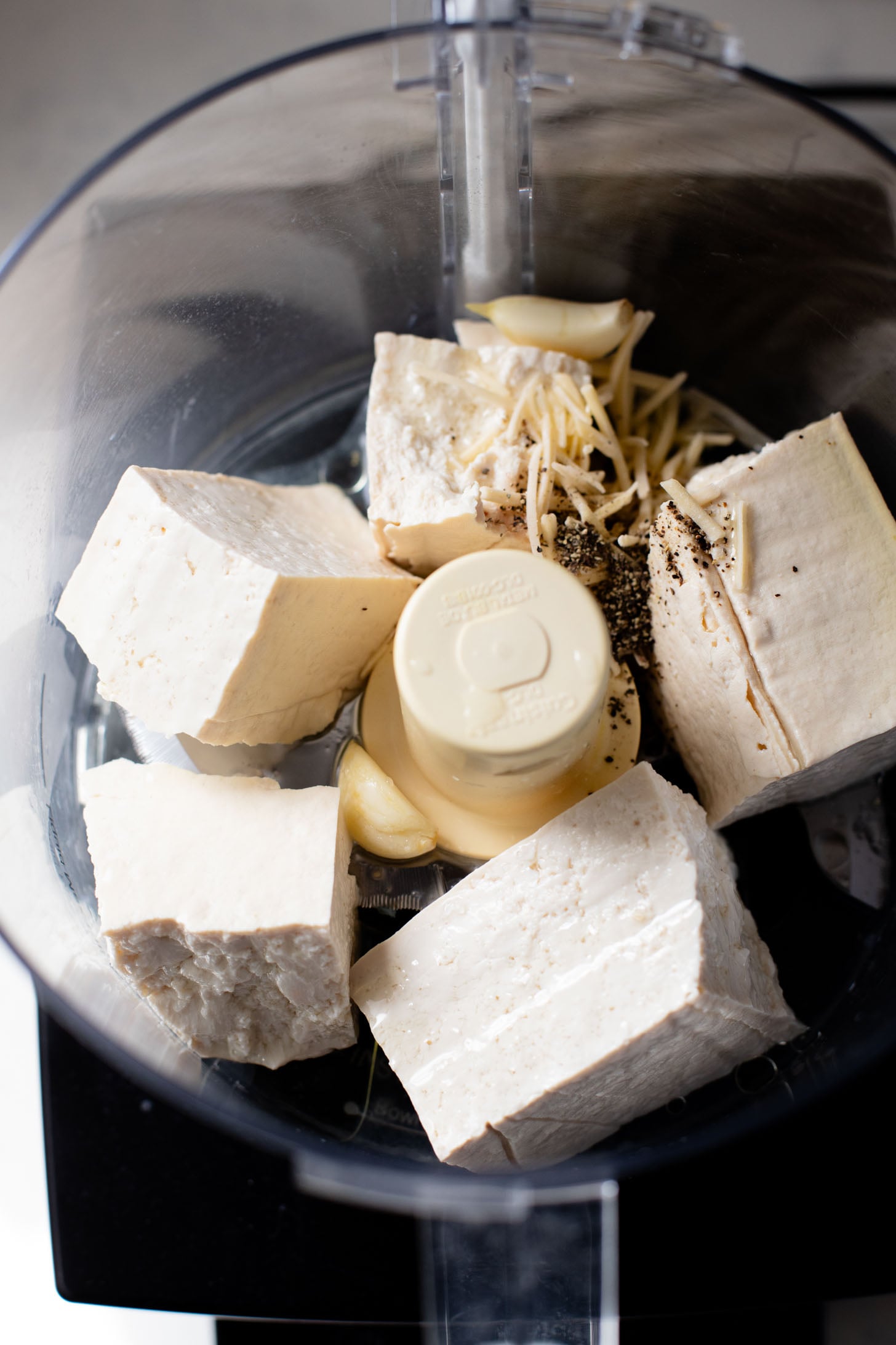 These Delicious Vegan Stuffed Shells are simple to make and even easier to eat. Filled with homemade tofu ricotta, spinach & basil in marinara | ThisSavoryVegan.com