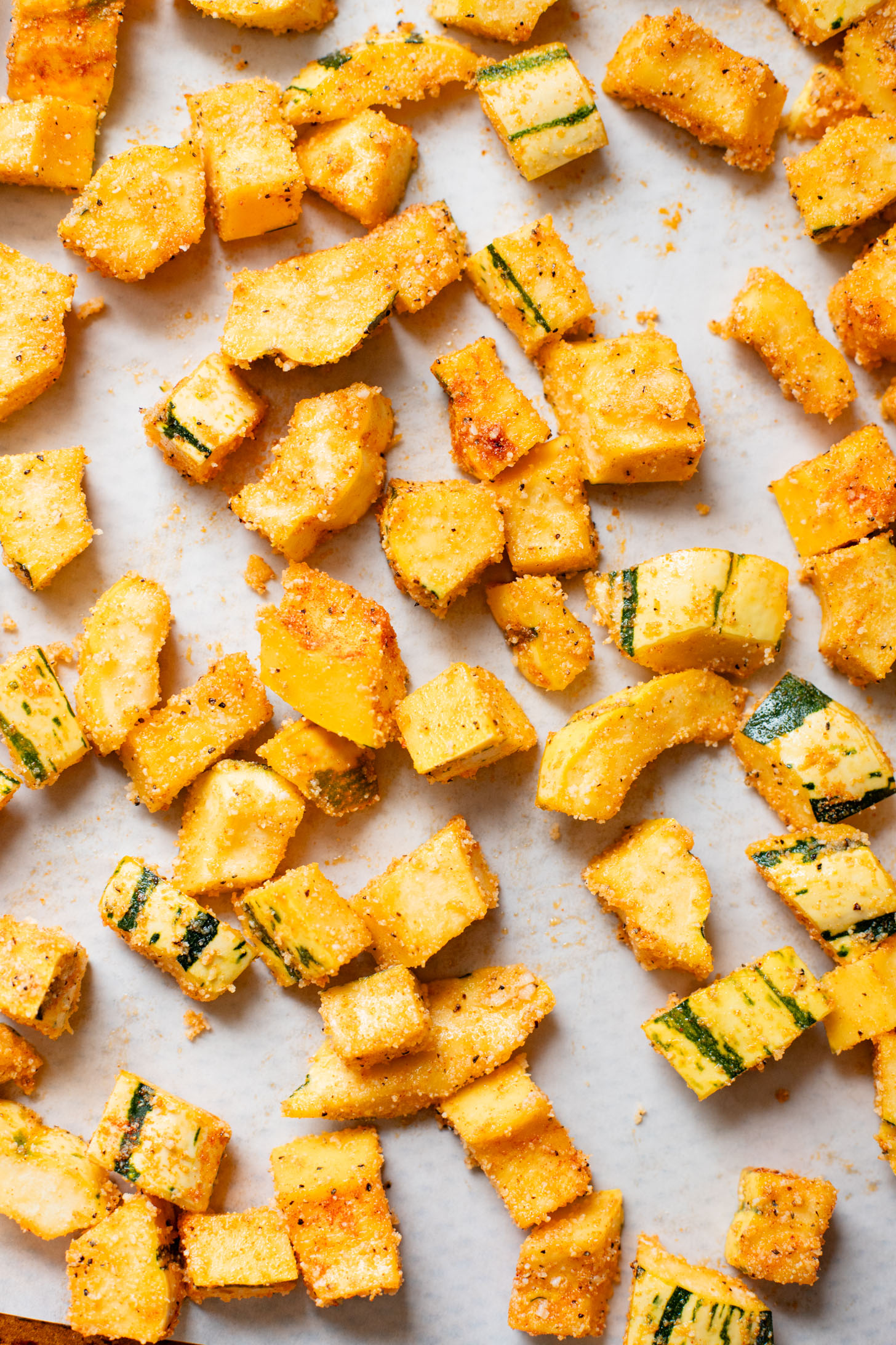 This Fall Harvest Salad is filled with roasted delicata squash, kale & red onion tossed in a creamy tahini dressing. Serve as a main or a side | ThisSavoryVegan.com