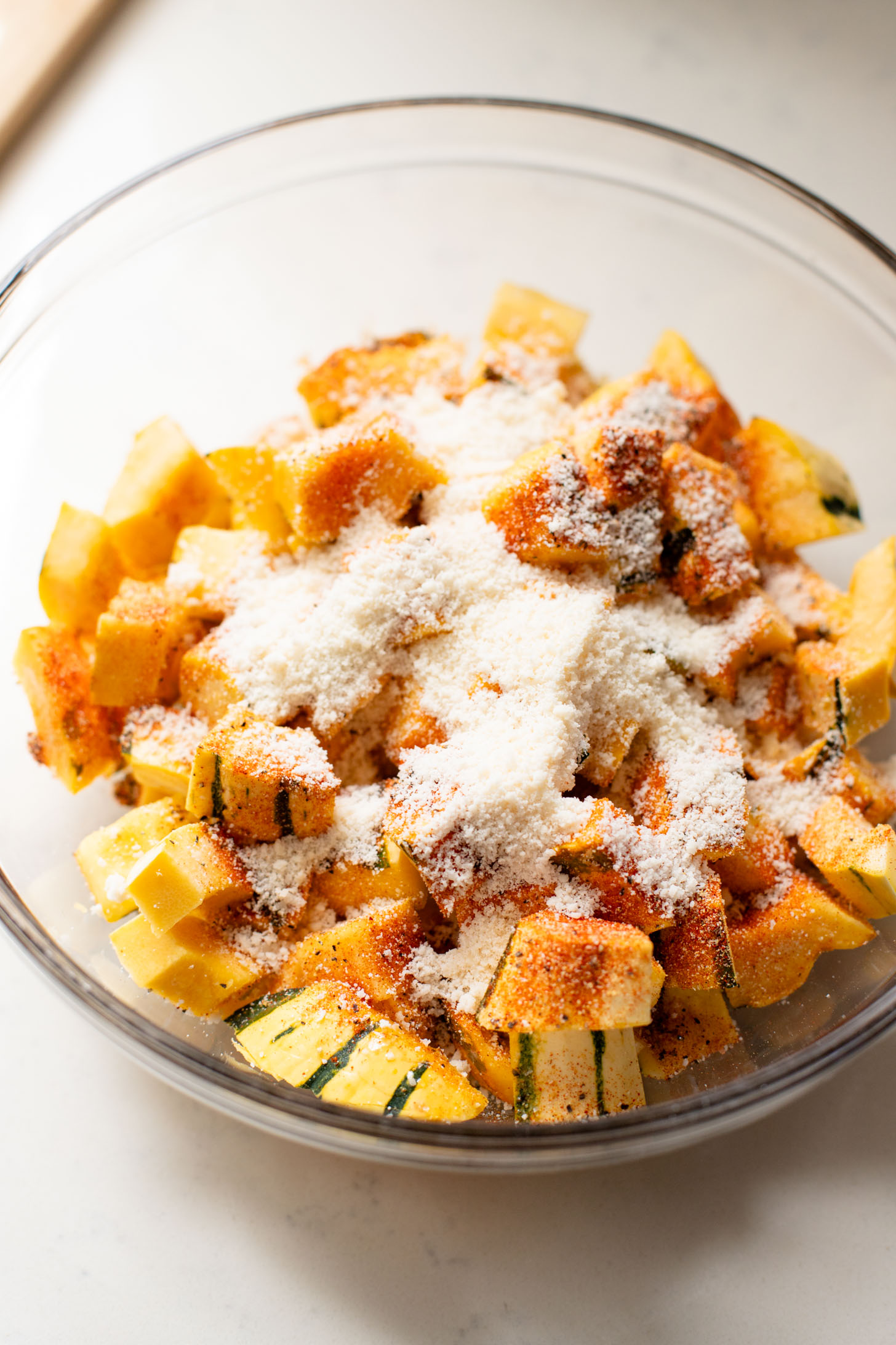 This Fall Harvest Salad is filled with roasted delicata squash, kale & red onion tossed in a creamy tahini dressing. Serve as a main or a side | ThisSavoryVegan.com