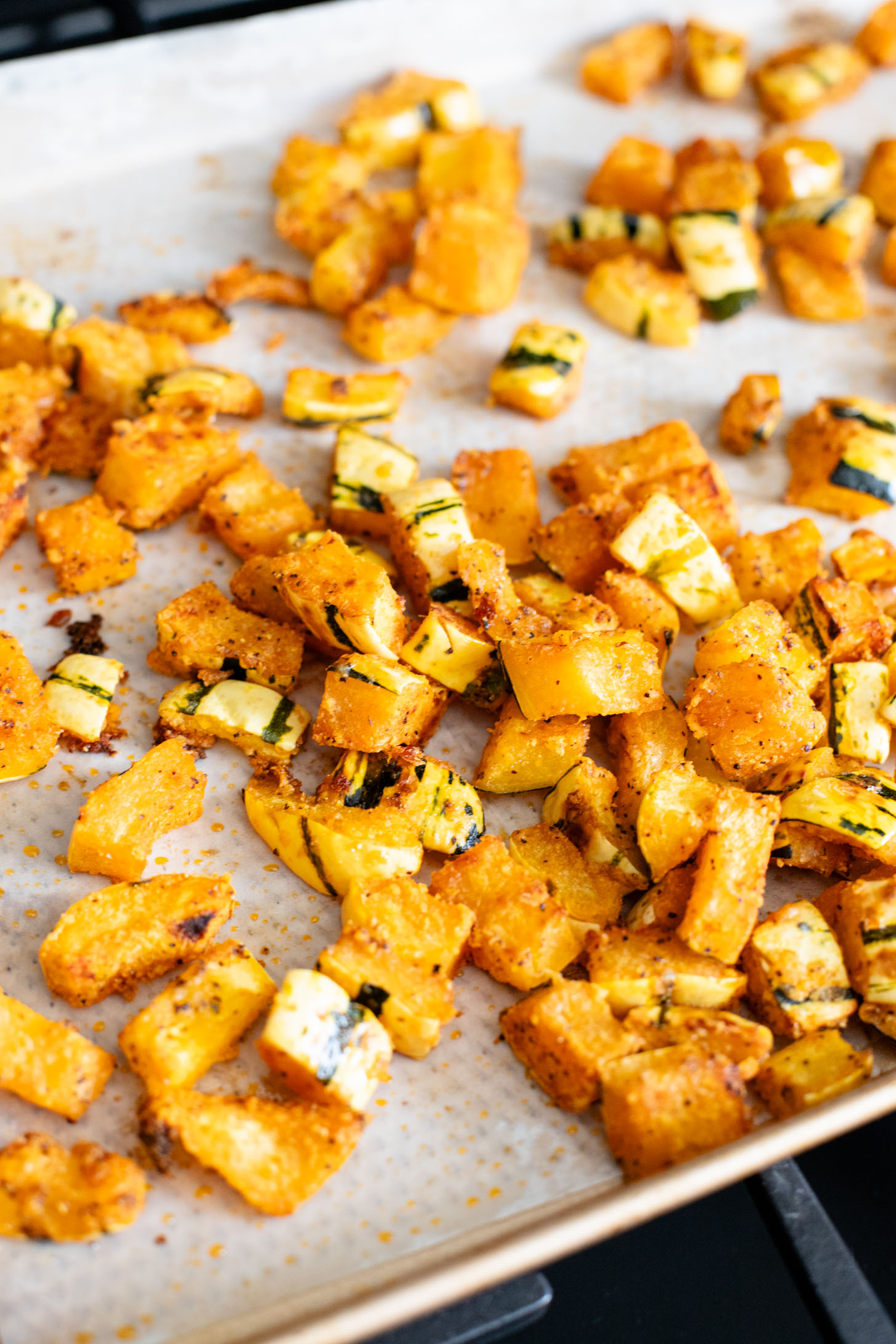 This Fall Harvest Salad is filled with roasted delicata squash, kale & red onion tossed in a creamy tahini dressing. Serve as a main or a side | ThisSavoryVegan.com